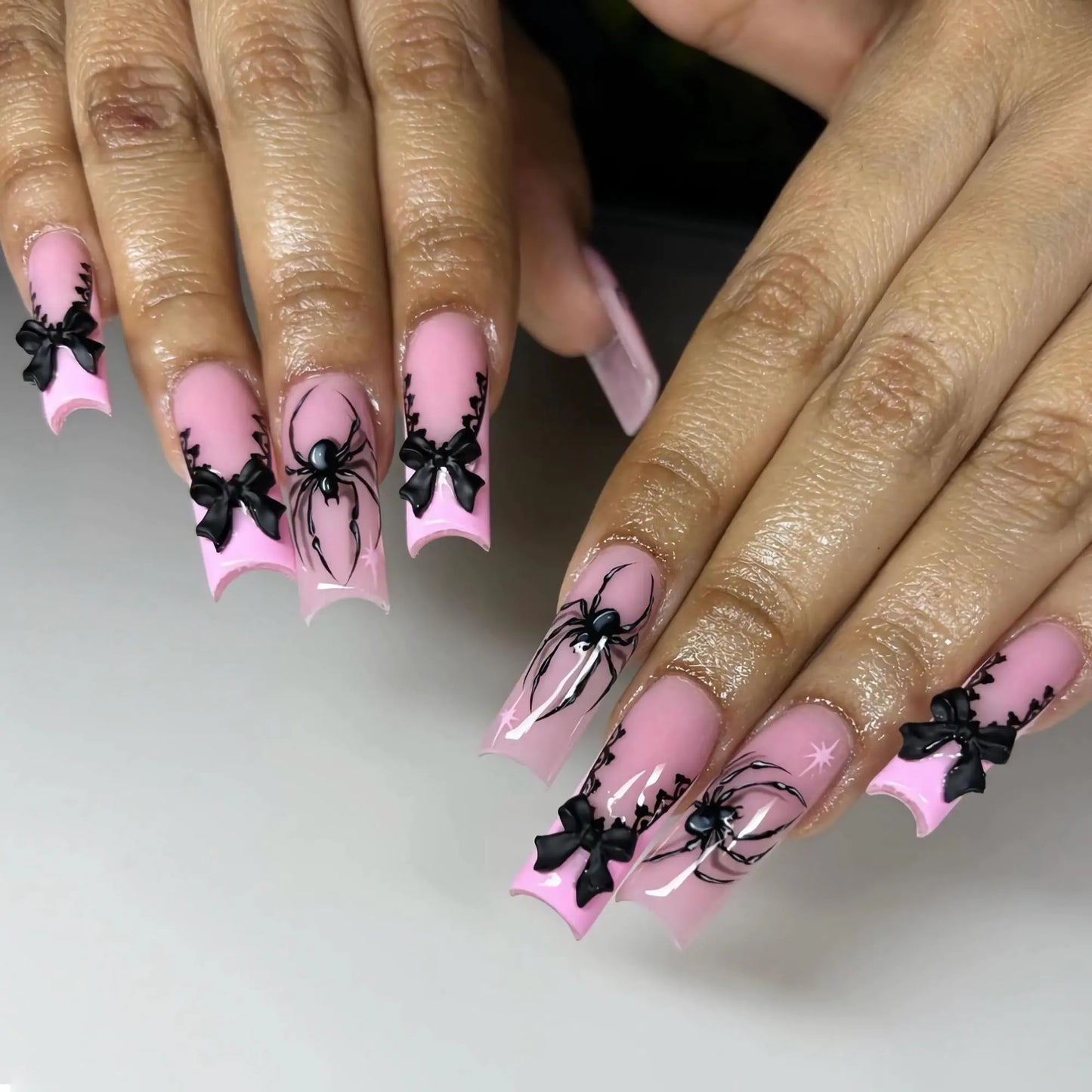 BABALAL Press on Nails Long Square Fake Nails Pink Glue on Nails Black Spider Goth Design and Bow Charm Acrylic Nails 24Pcs Squoval Halloween Stick on Nails